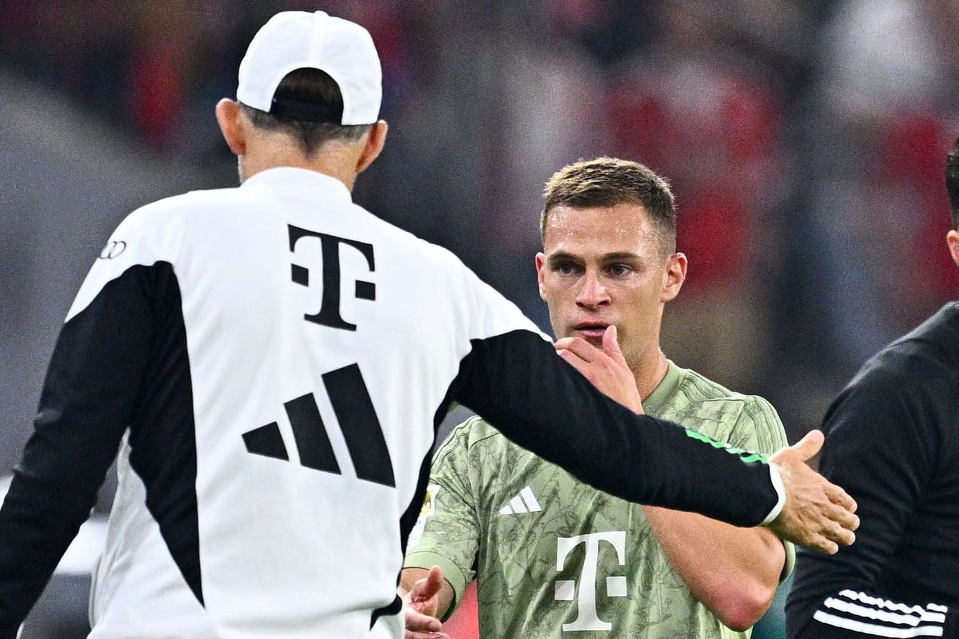 Joshua Kimmich (r.) mit Thomas Tuchel: Der Nationalspieler wollte auf dem Platz bleiben.