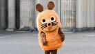 Die "Maus" aus der "Sendung mit der Maus" vor dem Brandenburger Tor: Der Sender versucht, die Wogen zu glätten.