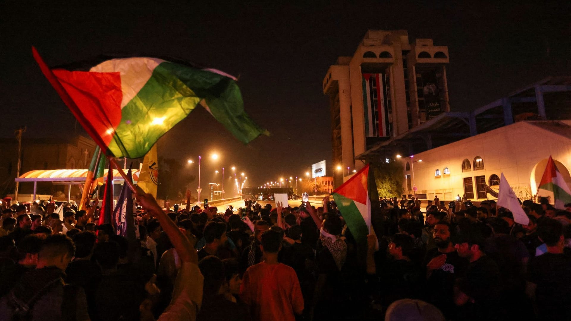 Iraqis take part in a protest in Baghdad