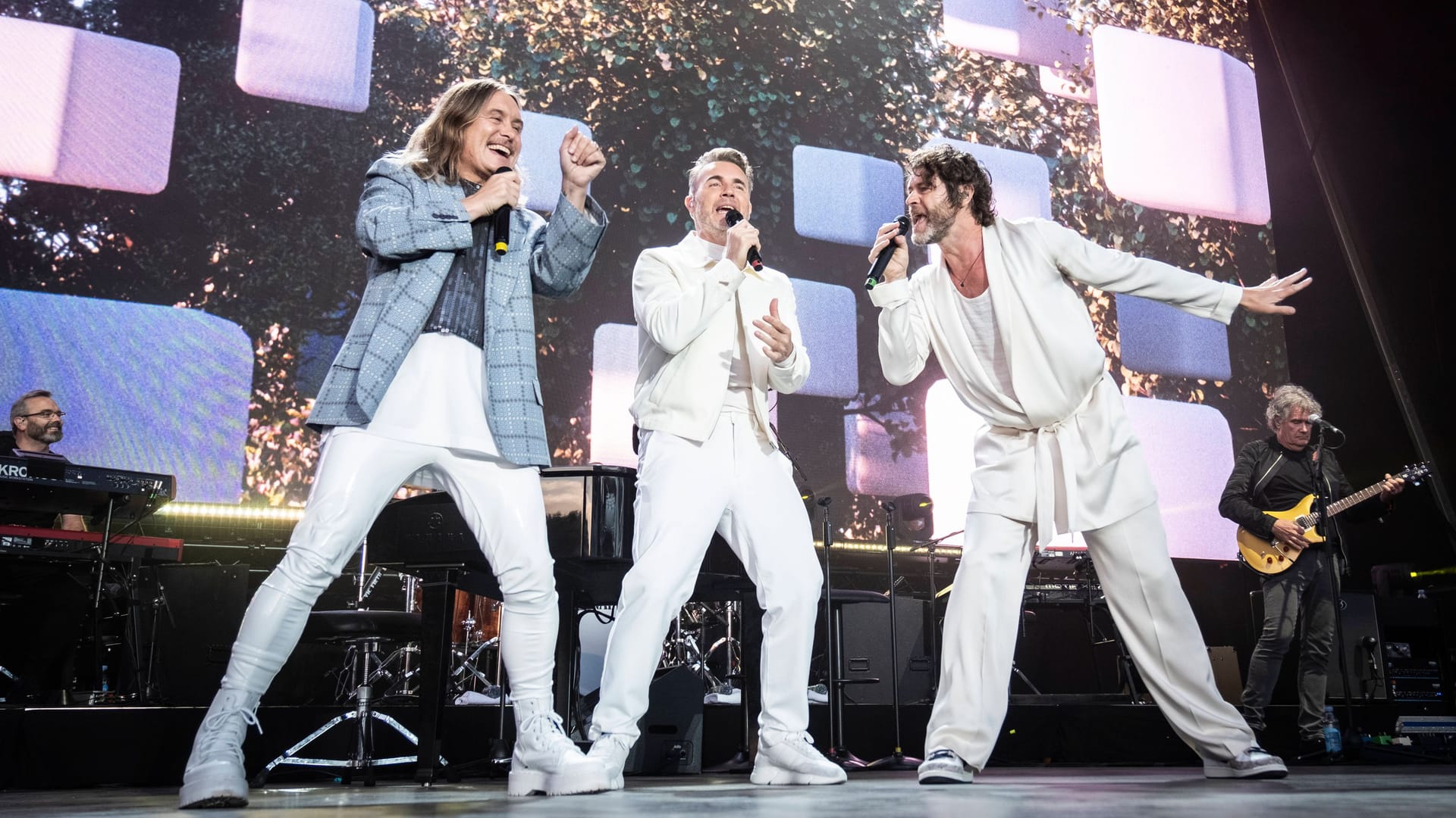 Take That während eines Auftritts in Dänemark (Archivbild): Im kommenden Jahr tritt die Band in Hannover auf.