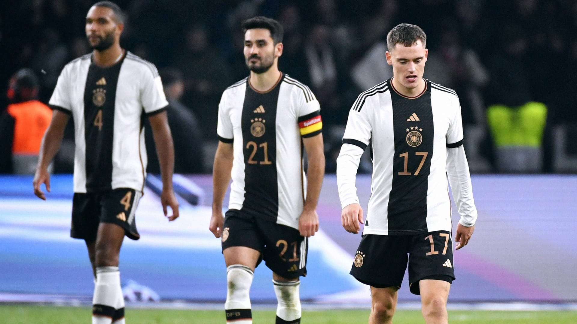 Jonathan Tah, İlkay Gündoğan und Florian Wirtz (von links nach rechts): Die drei Nationalspieler erlebten einen bitteren Abend in Berlin.