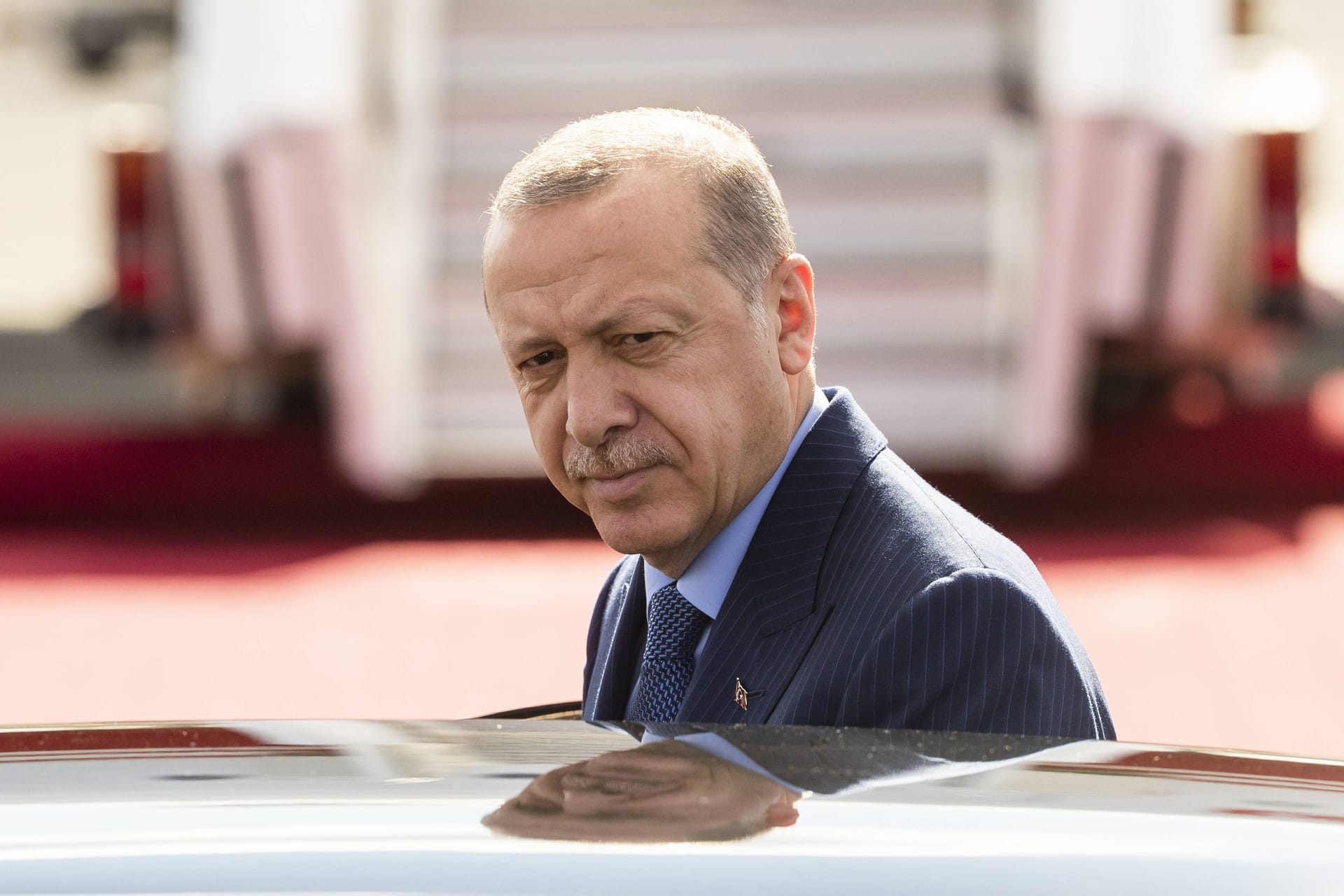 Turkish President Recep Tayyip Erdogan gets into the presidential car after his arrival at Tegel airport in Berlin, Germany in September 2018.