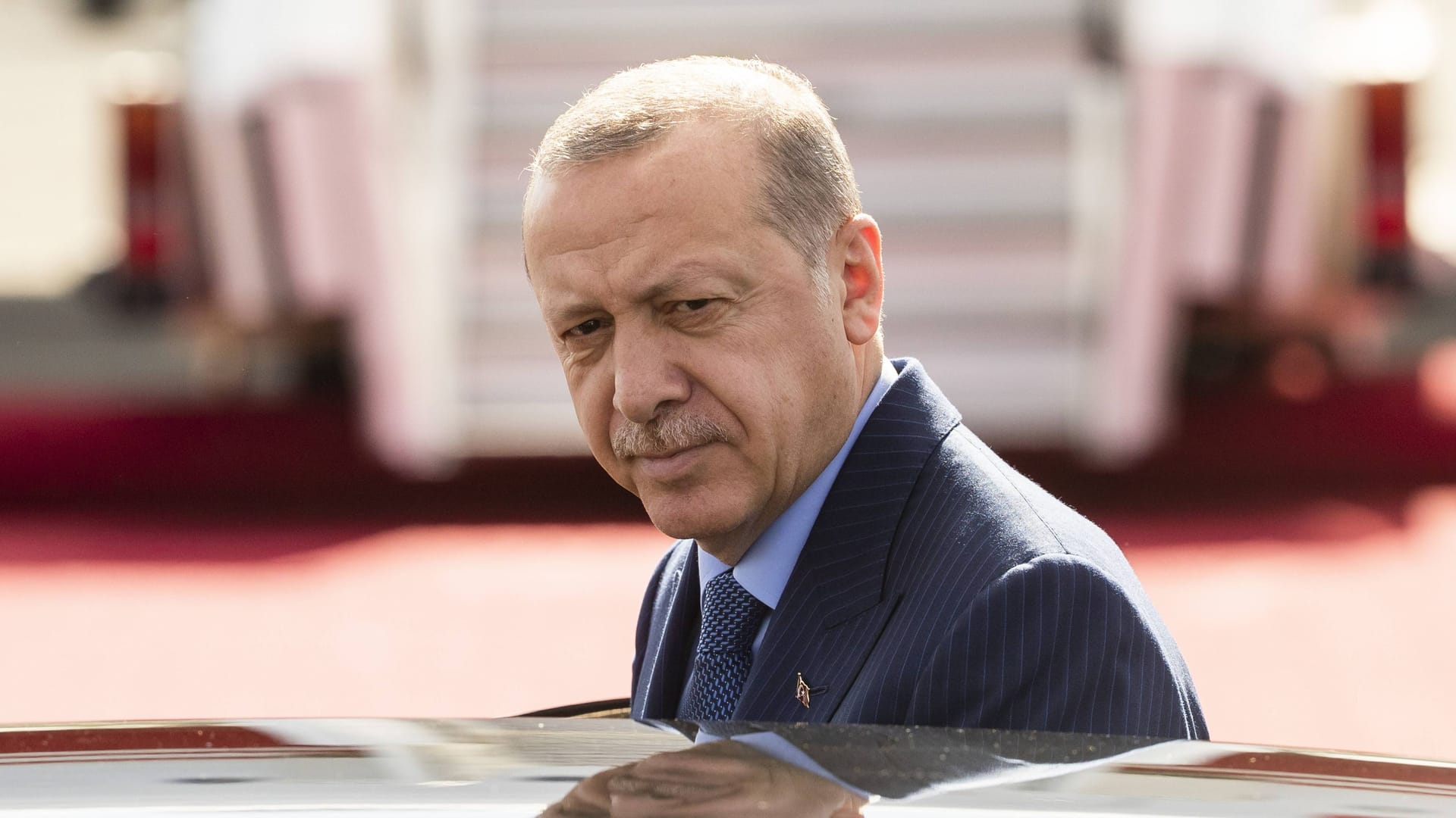 Turkish President Recep Tayyip Erdogan gets into the presidential car after his arrival at Tegel airport in Berlin, Germany in September 2018.