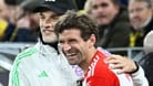 Thomas Tuchel (l.) und Thomas Müller: Der Trainer des FC Bayern und der Routinier präsentierten sich beim 4:0 in Dortmund angriffslustig.