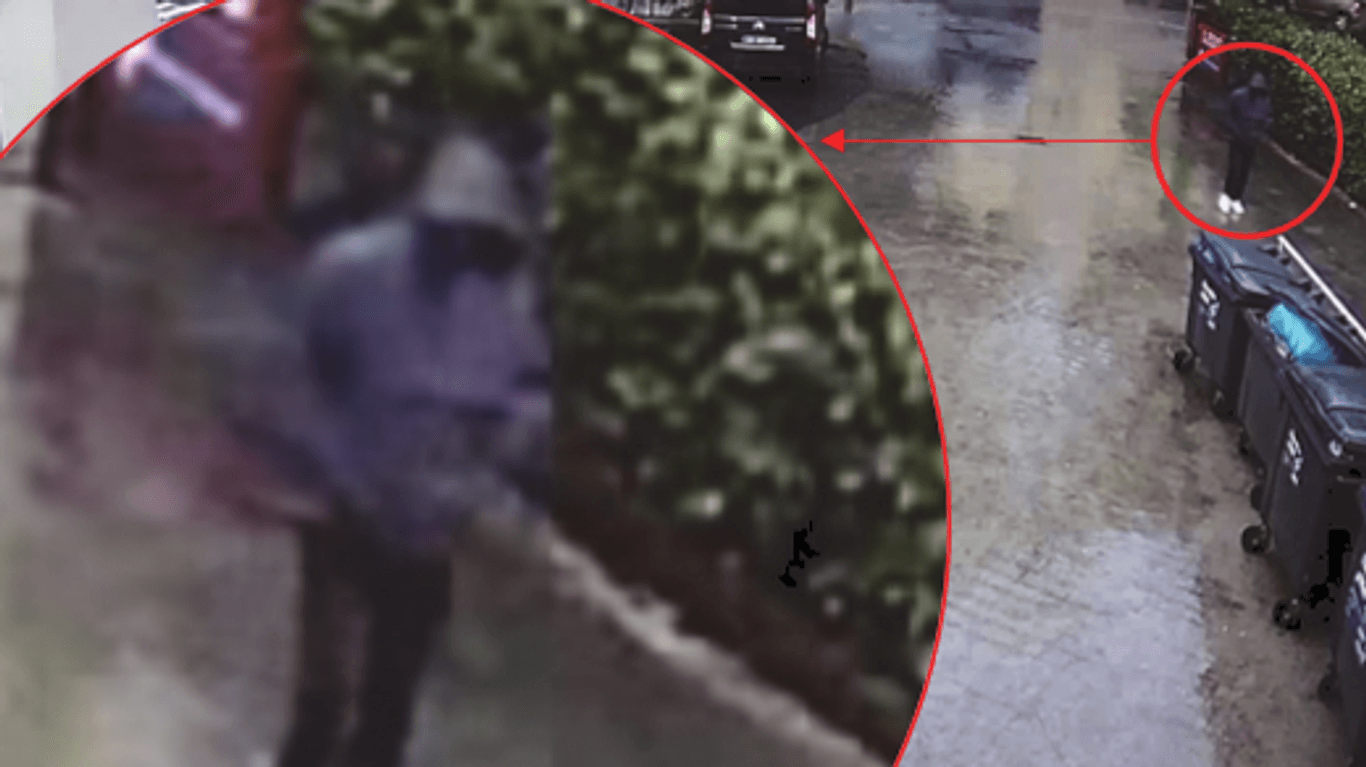Eine Person ist auf Bildern einer Überwachungskamera zu sehen: Der Mann soll eine Raub in einer Tiefgarage begangen haben.