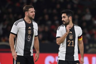 Niclas Füllkrug (l.) und İlkay Gündoğan: Sie verloren die letzten beiden Spiele mit der DFB-Elf.