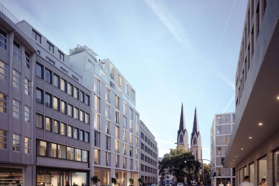 So könnte das Hotel (links, weiß) aussehen: Die Gestaltung der Fassade ist nicht Teil der Bauvoranfrage.