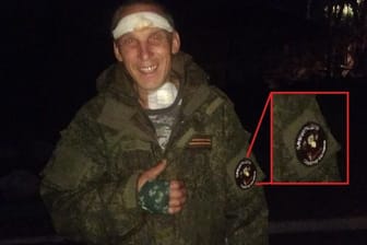 Der Kannibale Denis Gorin: Das Freiwilligenabzeichen soll beweisen, dass er für die russischen Streitkräfte kämpft.