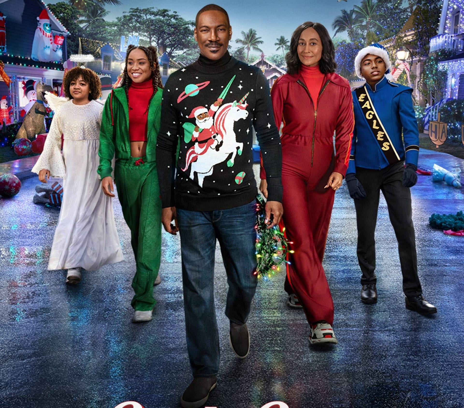 Eddie Murphy (M.) spielt in seinem neuen Film "Candy Cane Lane", der bei Amazon Prime Video zu sehen ist, einen von Weihnachten besessenen Vater.
