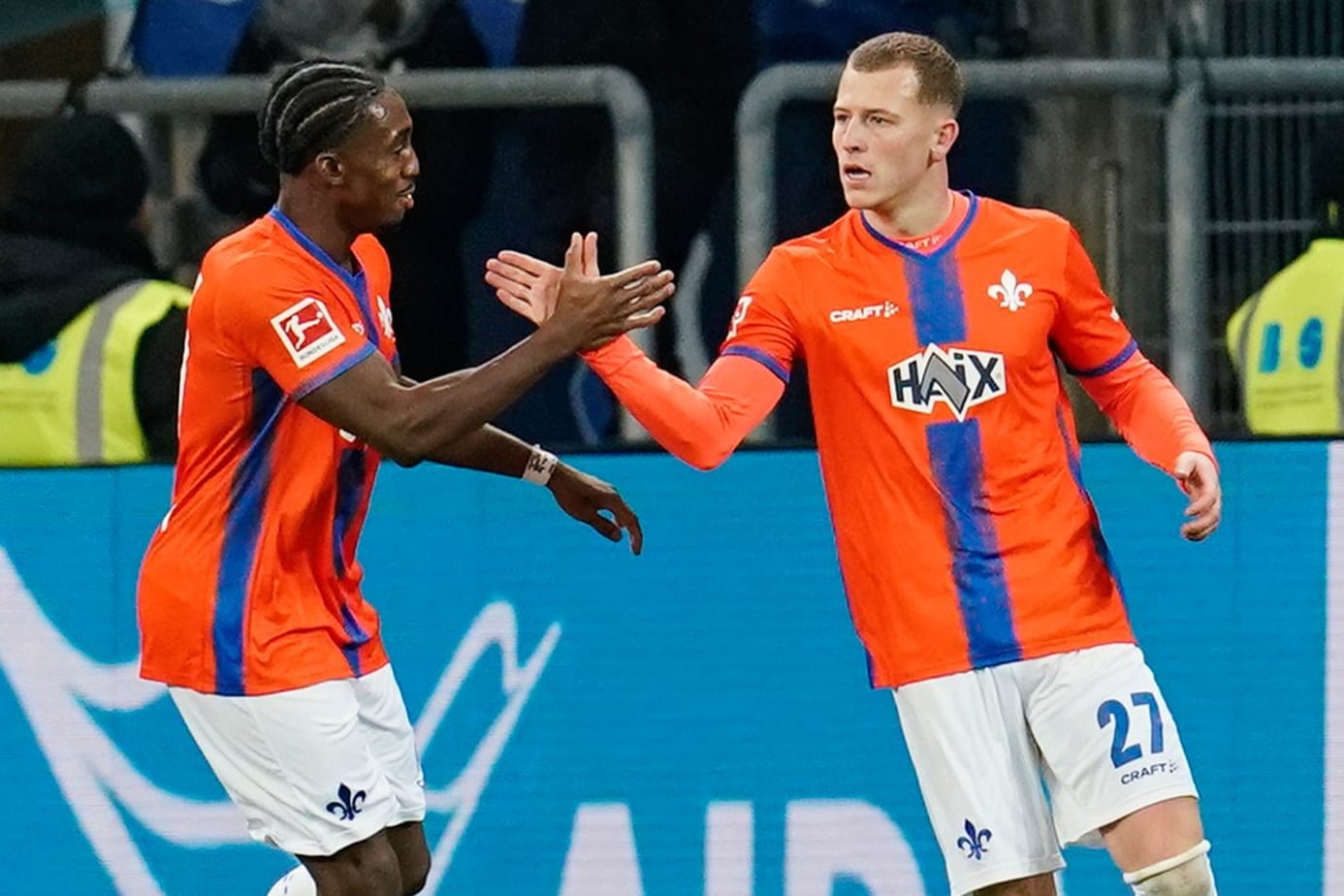Tim Skarke (r.) jubelt mit Frank Ronstadt: Gegen Hoffenheim erkämpfte sich Darmstadt einen Punkt.