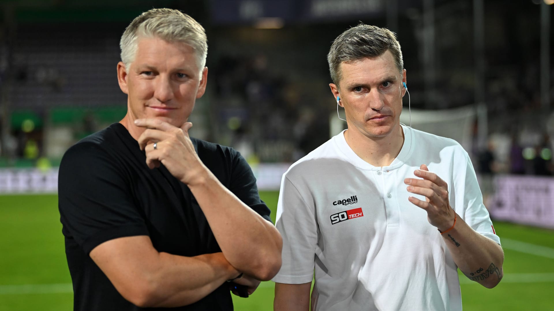 Bastian Schweinsteiger (l.) und sein Bruder Tobias Schweinsteiger (r.): Der Ex-Trainer des VfL Osnabrück steht bei den Fans von 1860 hoch im Kurs (Archivbild).