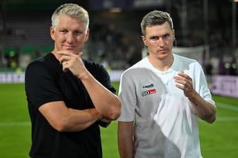 Bastian Schweinsteiger (l.) und sein Bruder Tobias Schweinsteiger (r.): Der Ex-Trainer des VfL Osnabrück steht bei den Fans von 1860 hoch im Kurs (Archivbild).