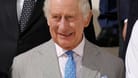 König Charles III. beim COP28-Klimagipfel. Seine Krawattenwahl löste Spekulationen aus.