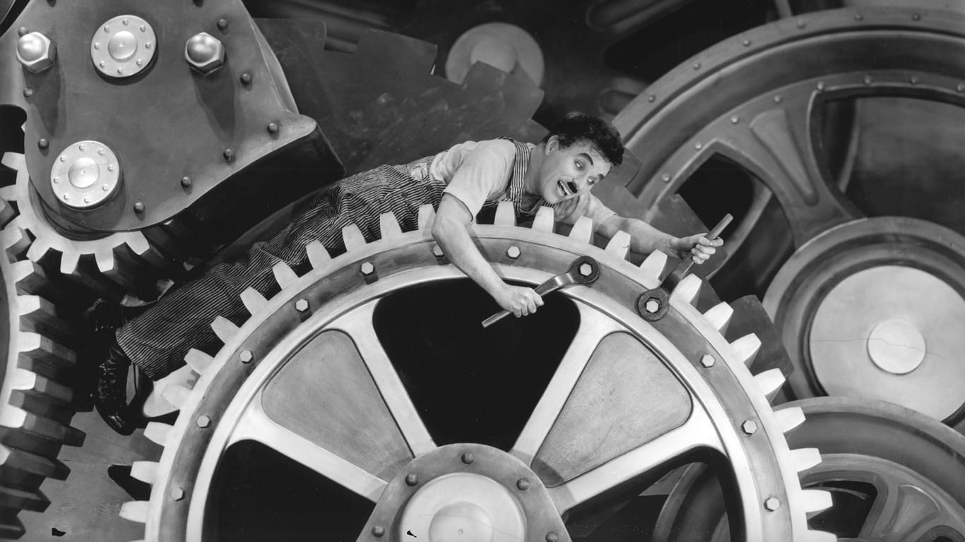 Arbeitsmaschine Mensch: Niemand verkörperte die Entmenschlichung der Fabrikarbeit um die Jahrhundertwende besser als Charlie Chaplin in dem Film: "Modern Times".