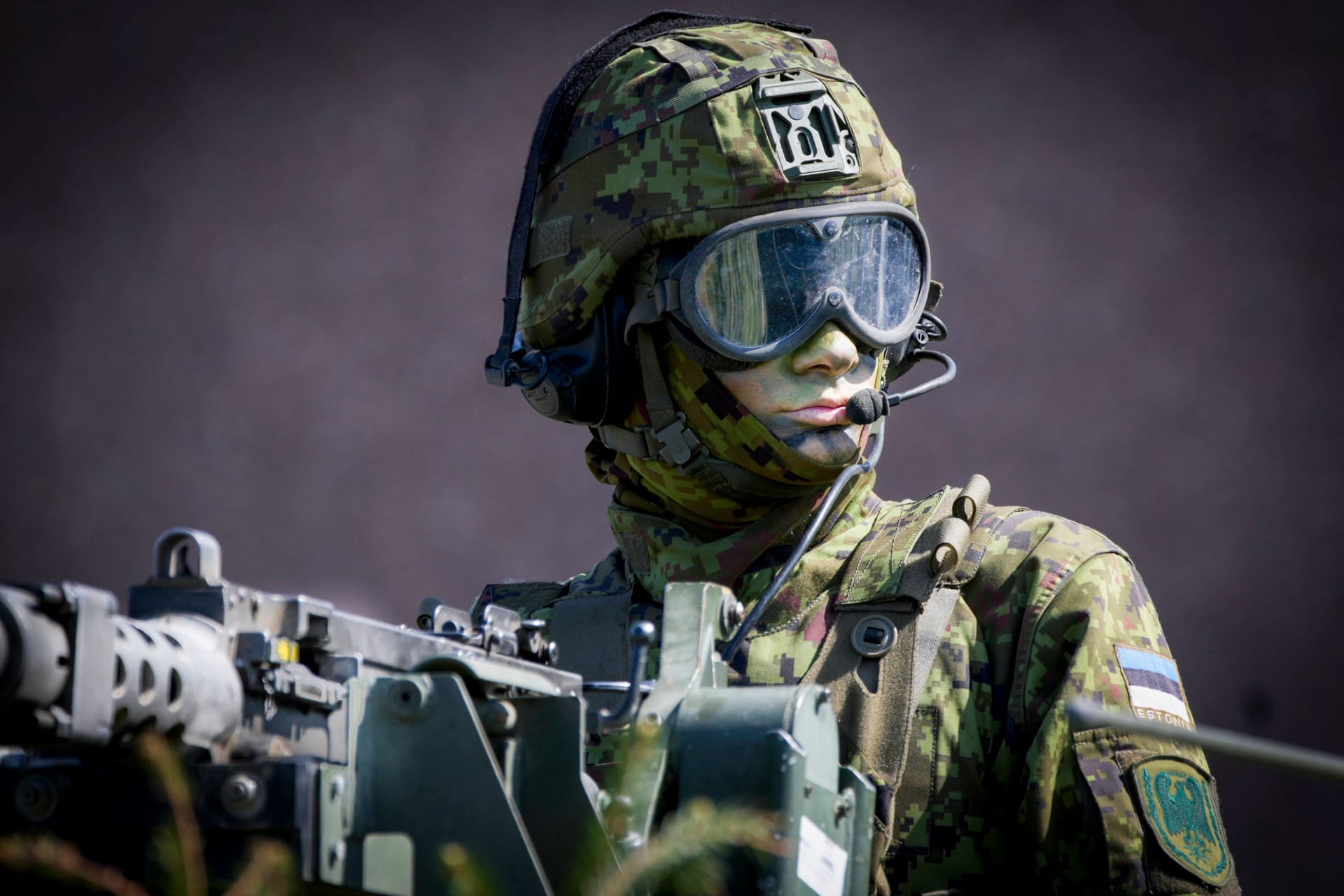 IMAGO / NurPhotoNATO Exercises In Estonia An Estonian soldier is seen in a camouflaged armoured personnel carrier in Tapa, Estonia on 20 May, 2023. Estonia is hosting the Spring Storm NATO exercises involving over 13 thousand personnel with US, German, British, French and Polish forces training together with the Estonian Defence Forces (eDF).