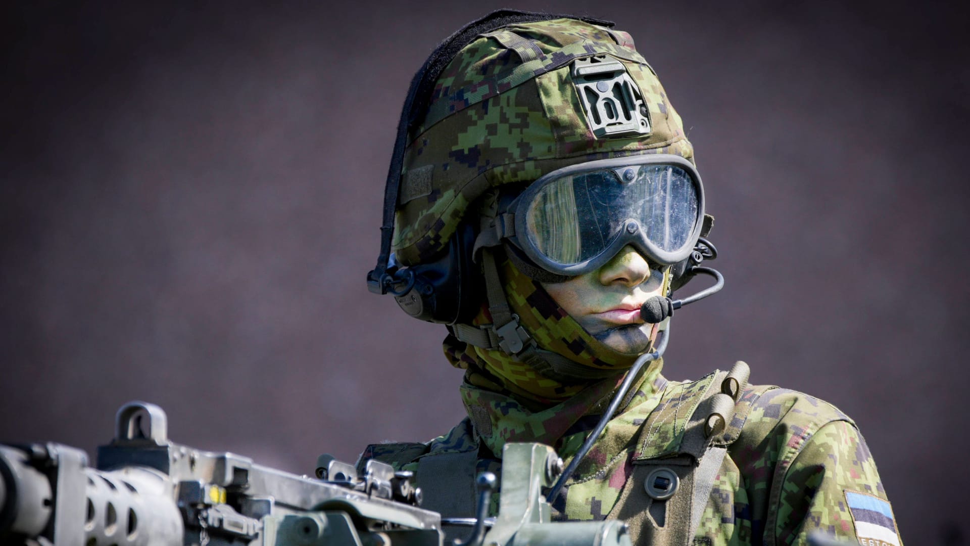 IMAGO / NurPhotoNATO Exercises In Estonia An Estonian soldier is seen in a camouflaged armoured personnel carrier in Tapa, Estonia on 20 May, 2023. Estonia is hosting the Spring Storm NATO exercises involving over 13 thousand personnel with US, German, British, French and Polish forces training together with the Estonian Defence Forces (eDF).