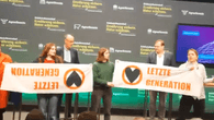Berlin: "Letzte Generation" stört Auftritt von Merz auf der Grünen Woche