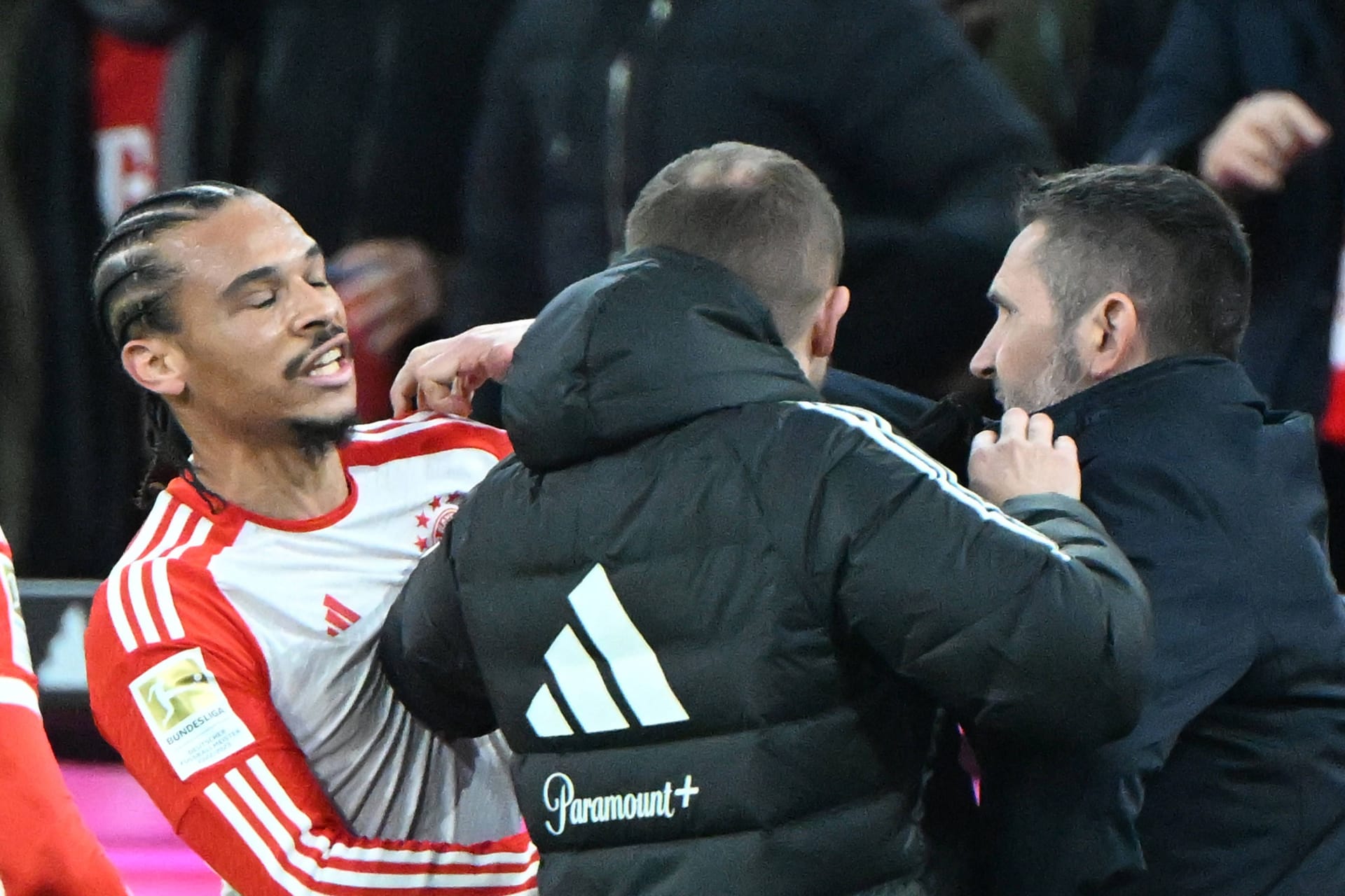 Hitzige Partie: Leroy Sané (l.) und Union-Trainer Nenad Bjelica (r.) geraten aneinander.