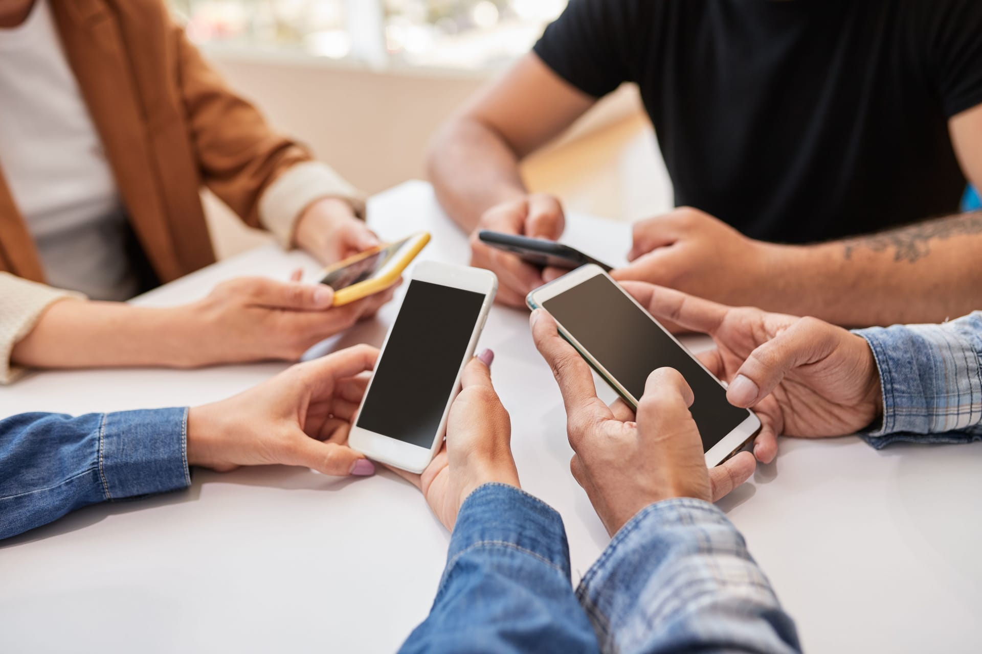 Crop friends using smartphones together