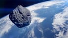 Ein Asteroid nähert sich der Erde (Symbolbild): Ein verglühender Asteroid über Brandenburg hat neulich für viel Aufsehen gesorgt.