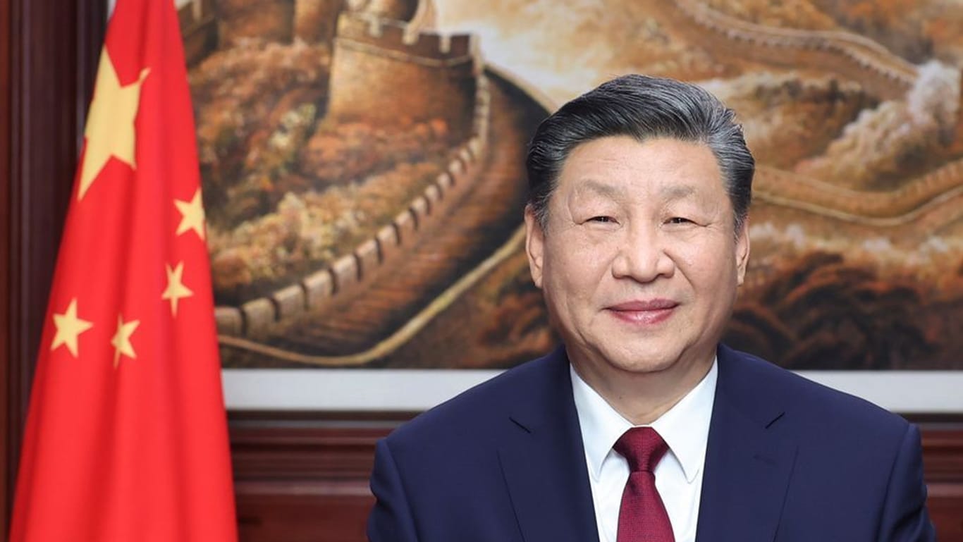 Lächelnder chinesischer Präsident Xi Jinping beim Neujahrsfest: Die wirtschaftliche Entwicklung seines Landes dürfte ihn weniger glücklich stimmen.