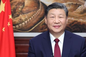 Lächelnder chinesischer Präsident Xi Jinping beim Neujahrsfest: Die wirtschaftliche Entwicklung seines Landes dürfte ihn weniger glücklich stimmen.