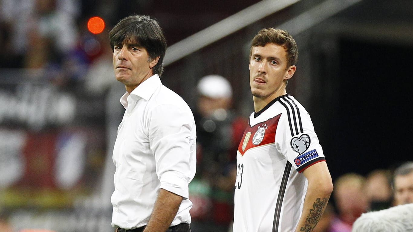 Joachim Löw (l.) und Max Kruse arbeiten als Trainer und Spieler im DFB-Team zusammen.