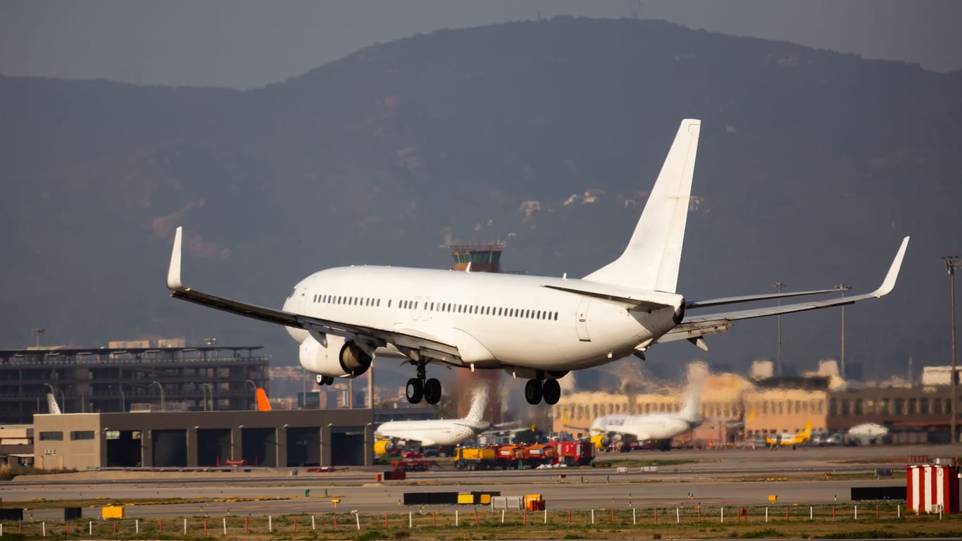 Passenger airplane landing in El Prat Airport