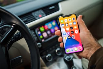 Apple Computers CarPlay from iOS iphone device inside car dashboard