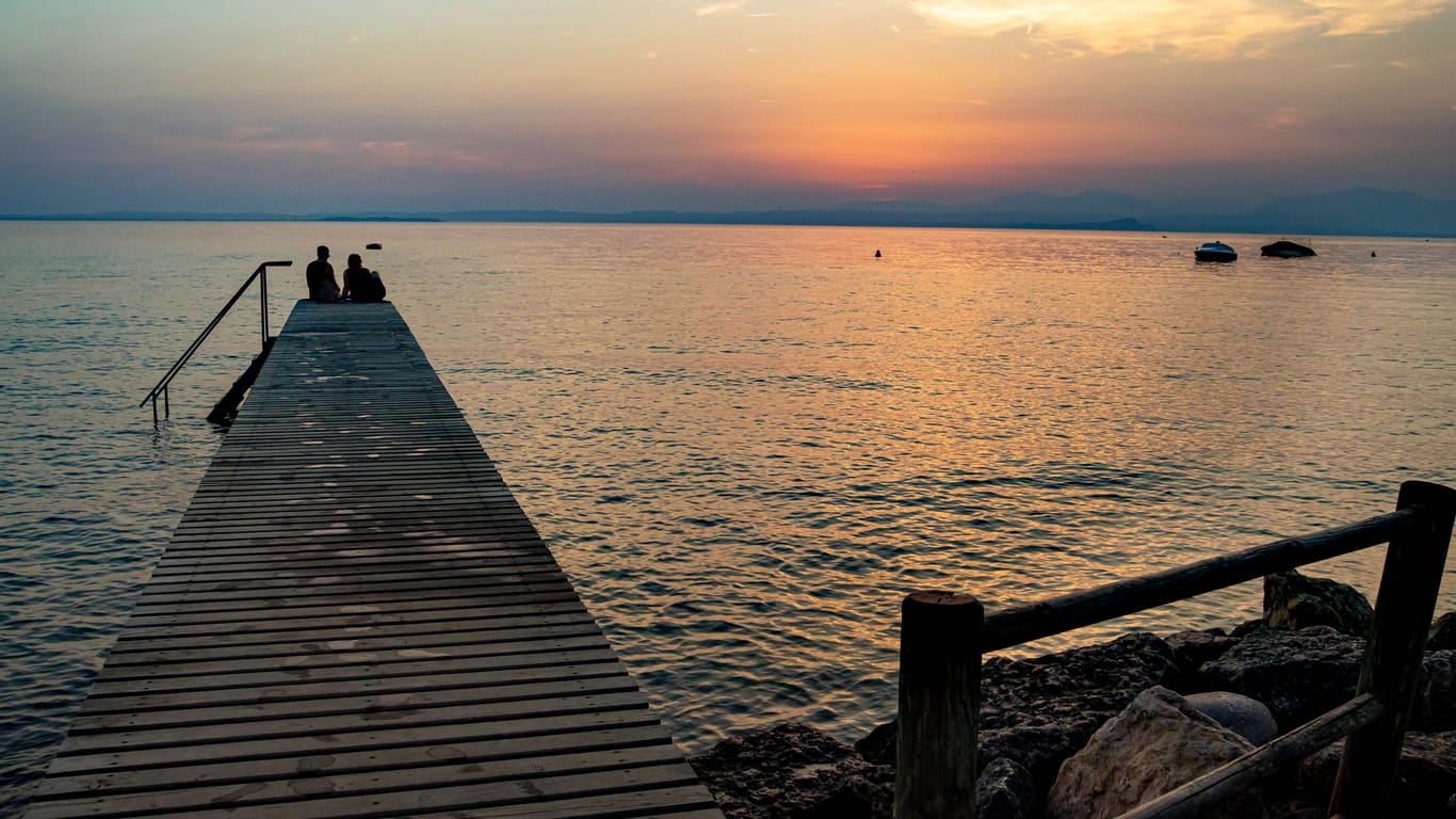 Lakeview at sunset from walkway at Cisano, Bardolino, Lake Garda, Italy
