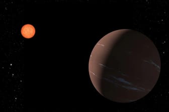 Künstlerische Darstellung von TOI-715 b: Der Planet bewegt sich in der habitablen Zone um seinen Stern.