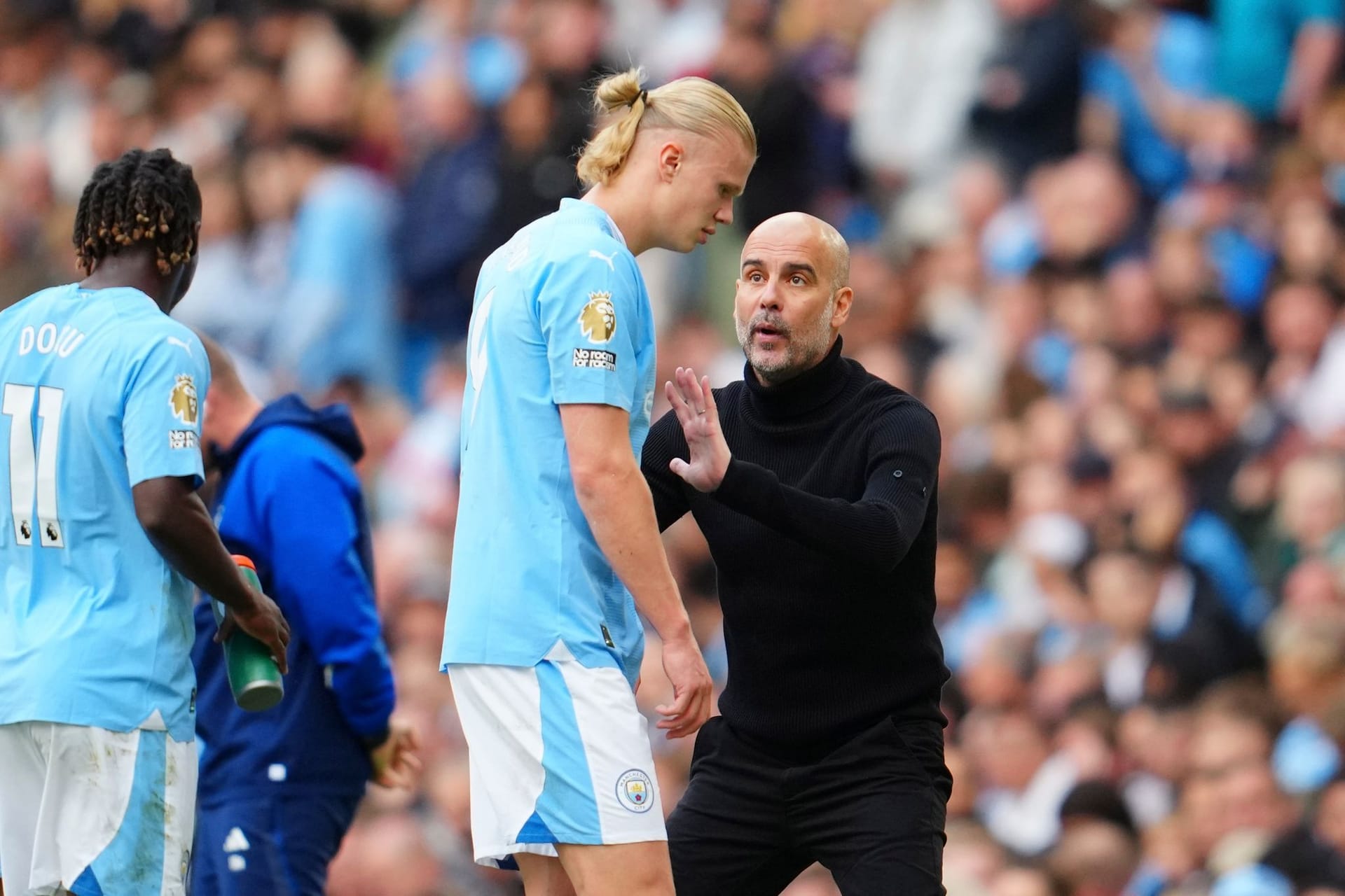 Pep Guardiola (r.) und Erling Haaland