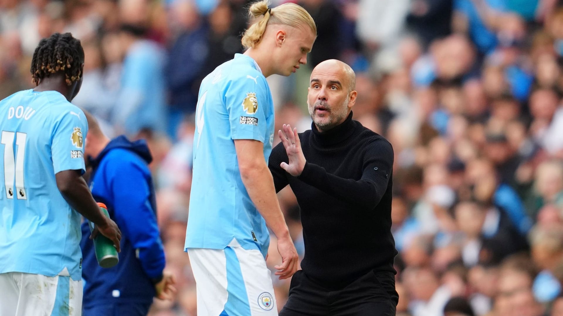 Pep Guardiola (r.) und Erling Haaland