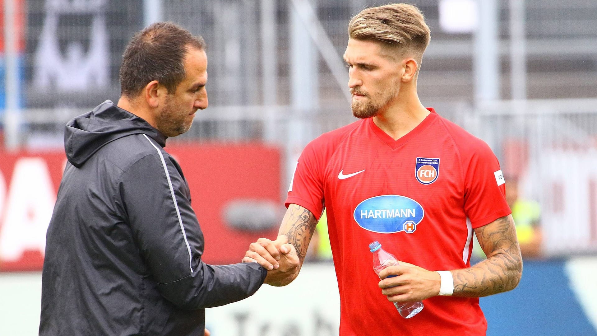 Robert Andrich mit seinem Ex-Trainer Frank Schmidt.