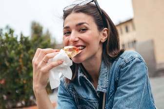 Pizza-Genuss (Symbolbild): In Essen sind die Gäste besonders zufrieden.