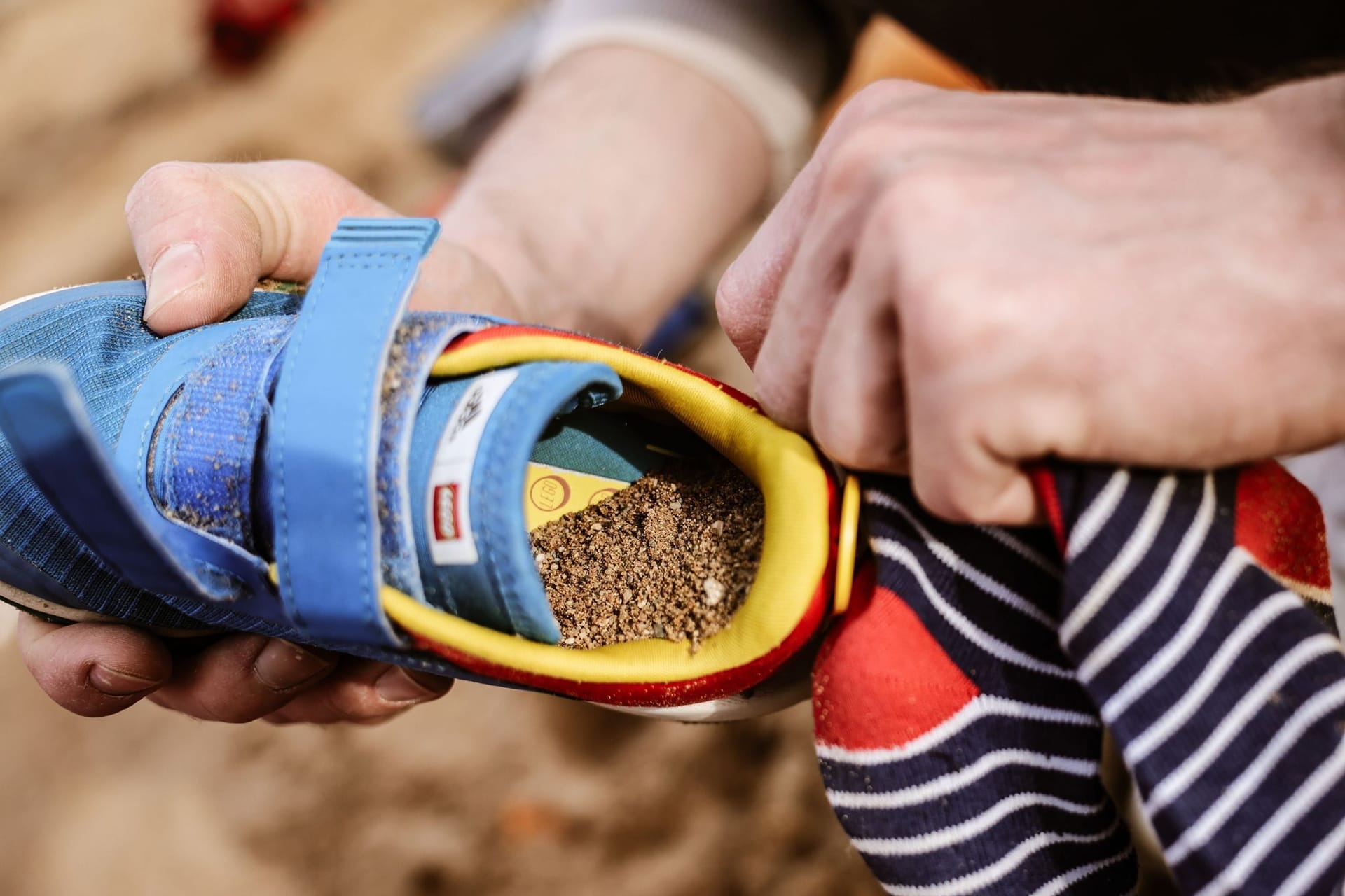 Sand in Kinderschuhen