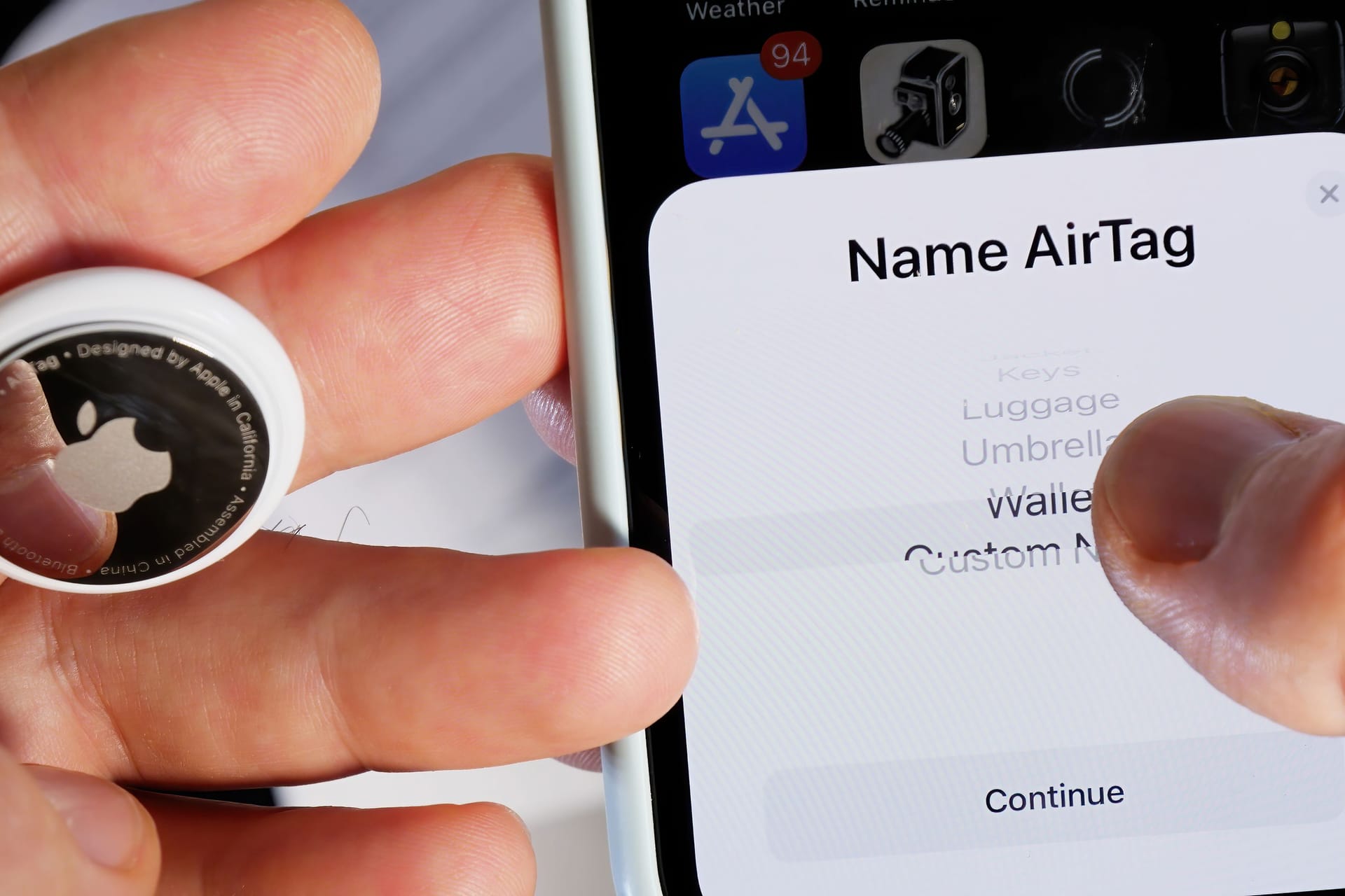 Name AirTag after unboxing in iPhone app for keys headphones handbag jacket luggage