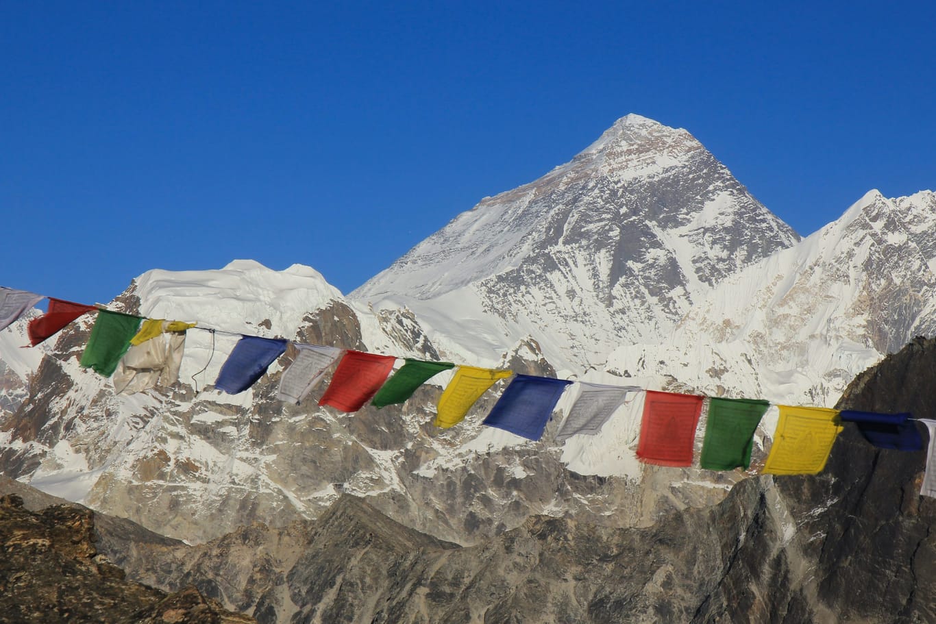 Prayer flags on Gokyo Peak and Mount Everest, Nepal.