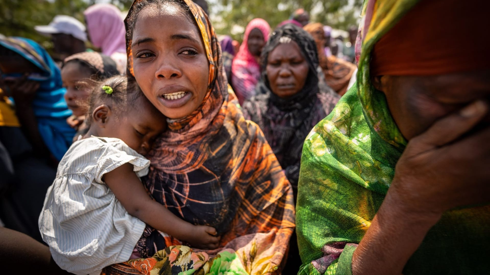 Frau mit Kleinkind im Südsudan Frau mit Kleinkind im Südsudan