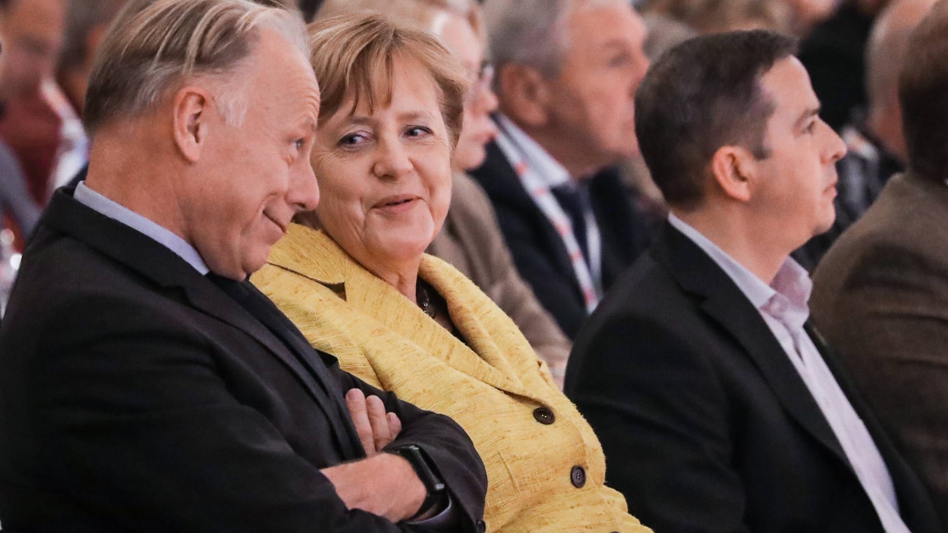 Jürgen Trittin und die damalige Bundeskanzlerin Angela Merkel bei einem Kongress in Hannover (Archivbild).