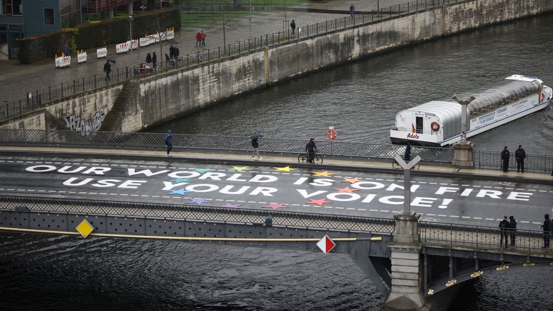 A message which activists painted on a bridge during the global Fridays for Future climate strike is pictured, in Berlin, Germany, April 19, 2024.