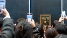 Kein Spaß im Louvre (Archivbild): Bis zu 25.000 Menschen am Tag wollen die "Mona Lisa" sehen. Bisher im Gedränge.