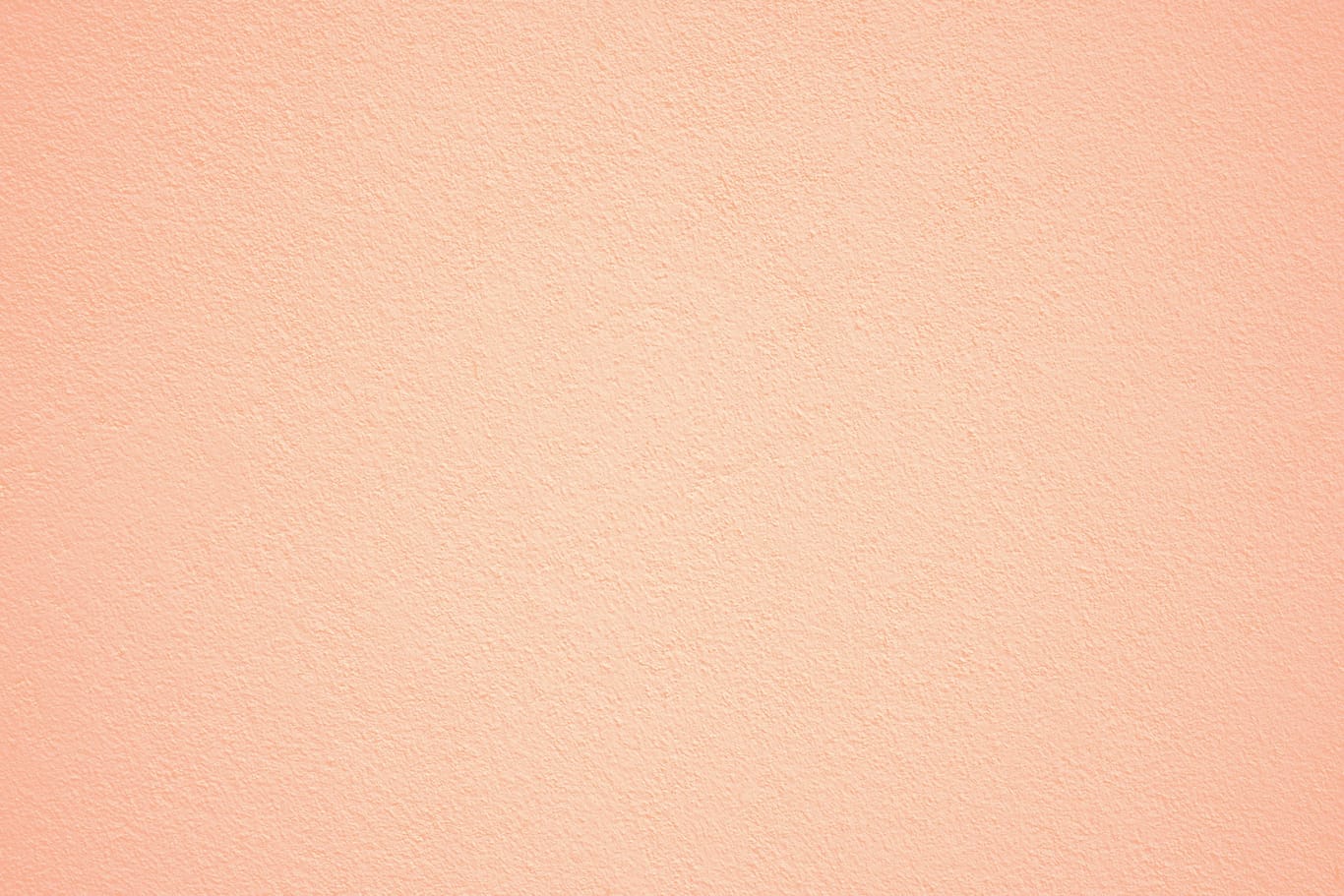 Die Pantone-Trendfarbe "Peach Fuzz" ist ein zarter Pfirsichton, der zwischen Orange und Rosa liegt.