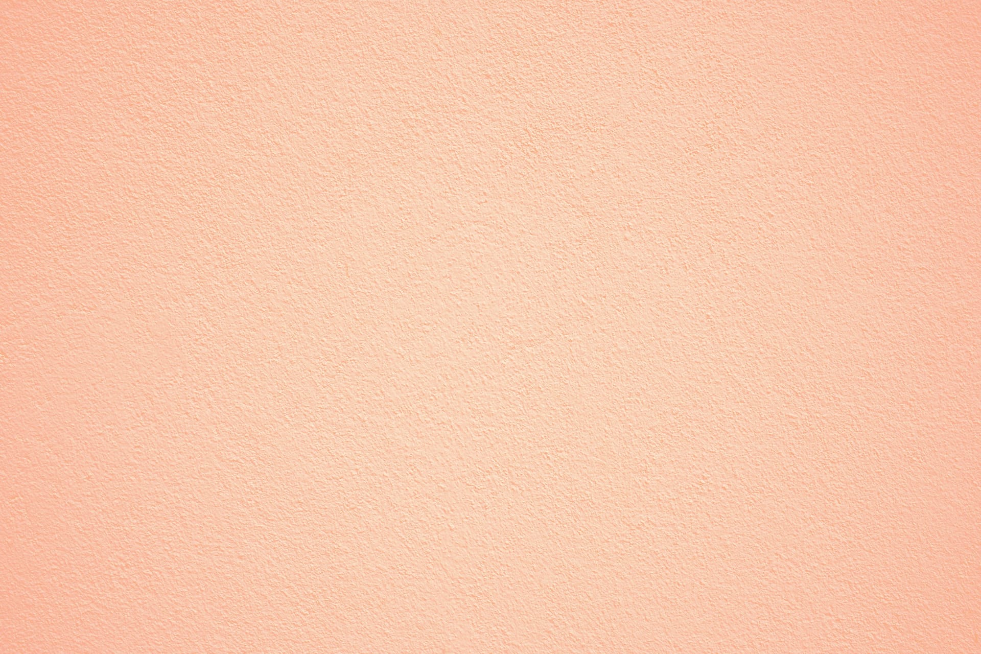 Die Pantone-Trendfarbe "Peach Fuzz" ist ein zarter Pfirsichton, der zwischen Orange und Rosa liegt.