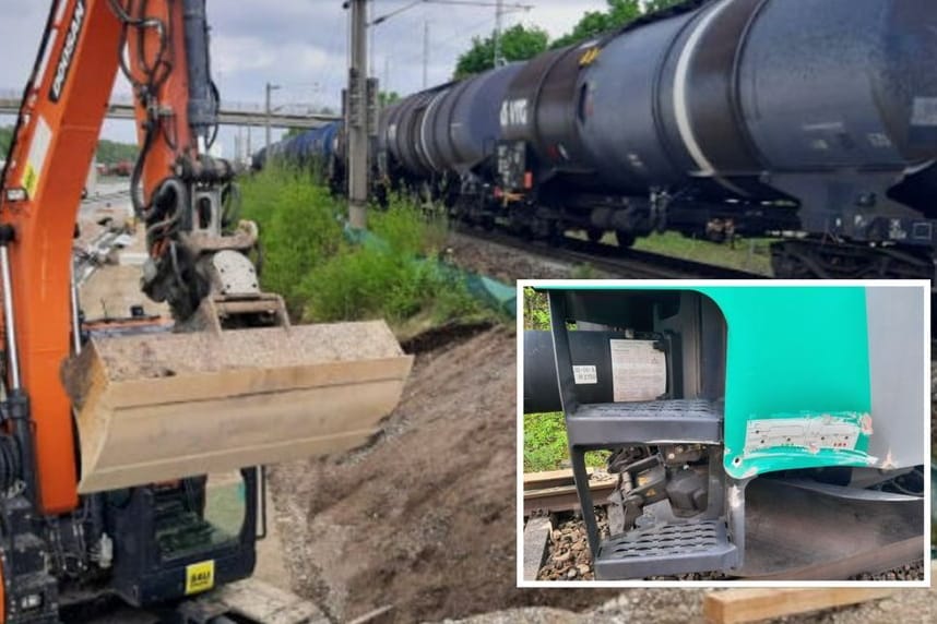 Eine Delle an der Außenseite (kleines Bild): Am Rangierbahnhofes Nord touchierte bei Bauarbeiten ein Bagger-Schwenkarm, wie dieser links (Sybmbolbild), einen Güterzug.