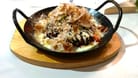 Okonomiyaki, ein herzhafter Pfannkuchen: Probieren kann man die japanische Spezialität in der Villa Kalka in Köln-Kalk.