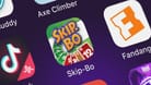 London, United Kingdom - September 30, 2018: Close-up shot of the Skip-Bo™ application icon from Magmic Inc. on an iPhone., London, United Kingdom - September 30, 2018: Close-up shot of the Skip-Bo™ application icon from Magmic Inc. on an iPhone.