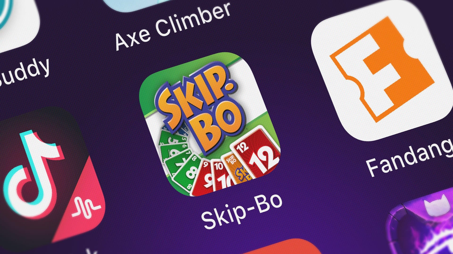 London, United Kingdom - September 30, 2018: Close-up shot of the Skip-Bo™ application icon from Magmic Inc. on an iPhone., London, United Kingdom - September 30, 2018: Close-up shot of the Skip-Bo™ application icon from Magmic Inc. on an iPhone.