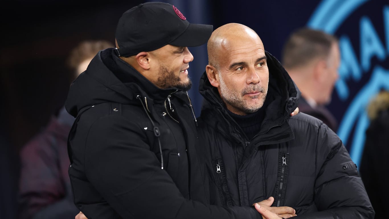 Vincent Kompany (l.) neben Lehrmeister Pep Guardiola.