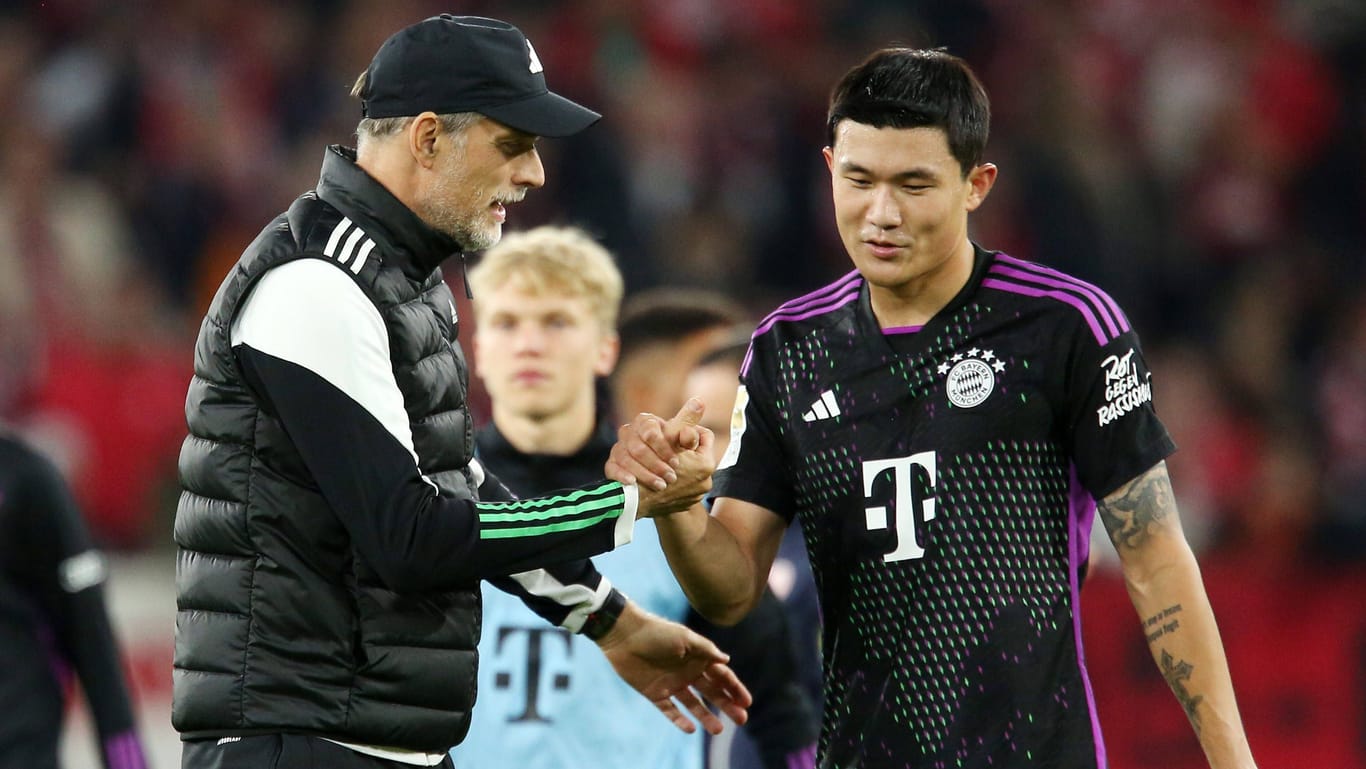 Thomas Tuchel (l.) und Min-jae Kim: Der scheidende Bayern-Trainer kritisierte seinen Abwehrspieler nach dem 2:2 gegen Real Madrid scharf.